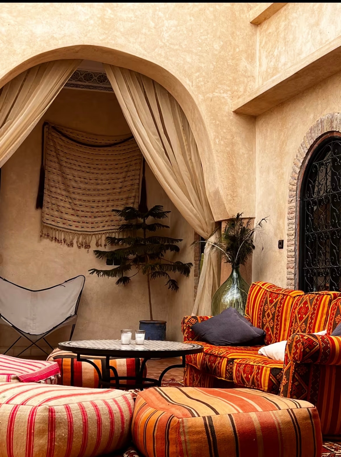 Moroccan courtyard lounge with traditional textiles