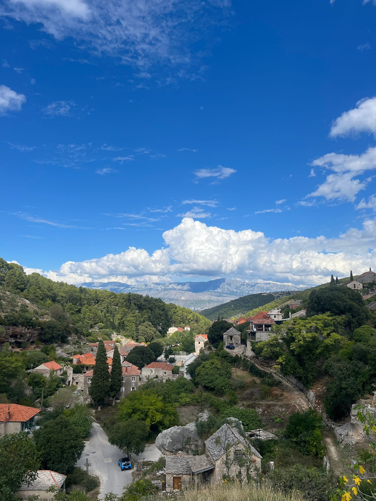 Croatian village of Dol nestled in mountain landscape